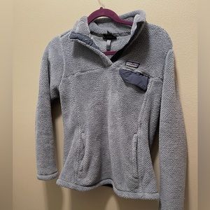 light blue patagonia sweater really good quality and condition.